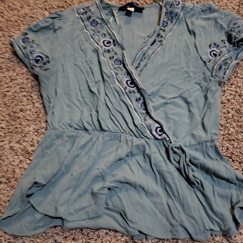 Light blue summer top with floural design